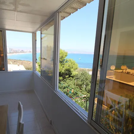 Coastal Retreat: Cabo De Las Huertas Beachfront Apartment